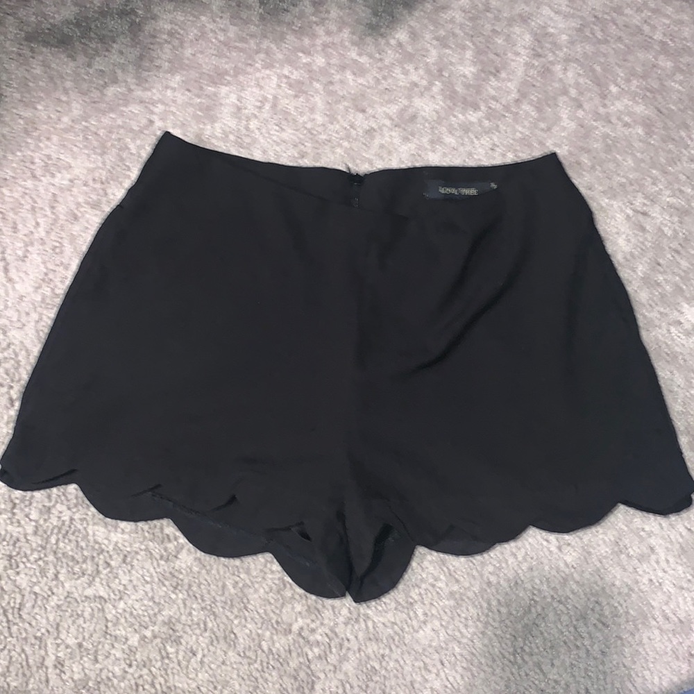 Black scalloped shorts